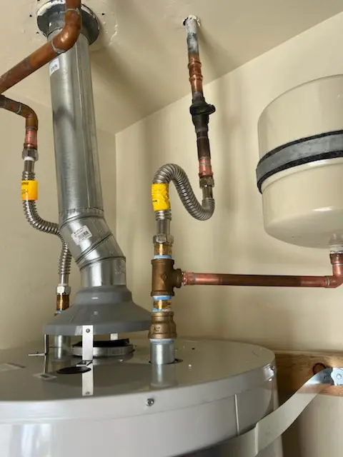 Water heater installation and plumbing repair in Country Club Heights
